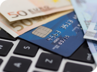 Euro and credit card on a key baord