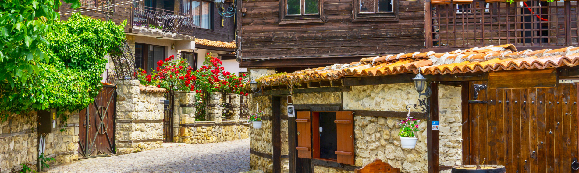 Traditional Black Sea houses and cobbled lanes in Nessebar's UNESCO-listed old town, a charming stop for Bulgaria holidays.
