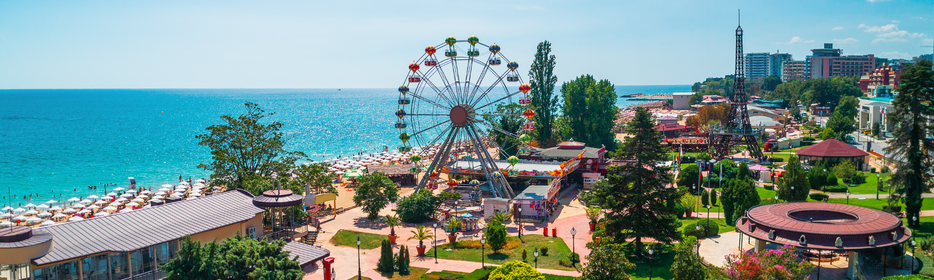 Ferris wheel and beachfront promenade at Sunny Beach, a popular resort for Bulgaria holidays.