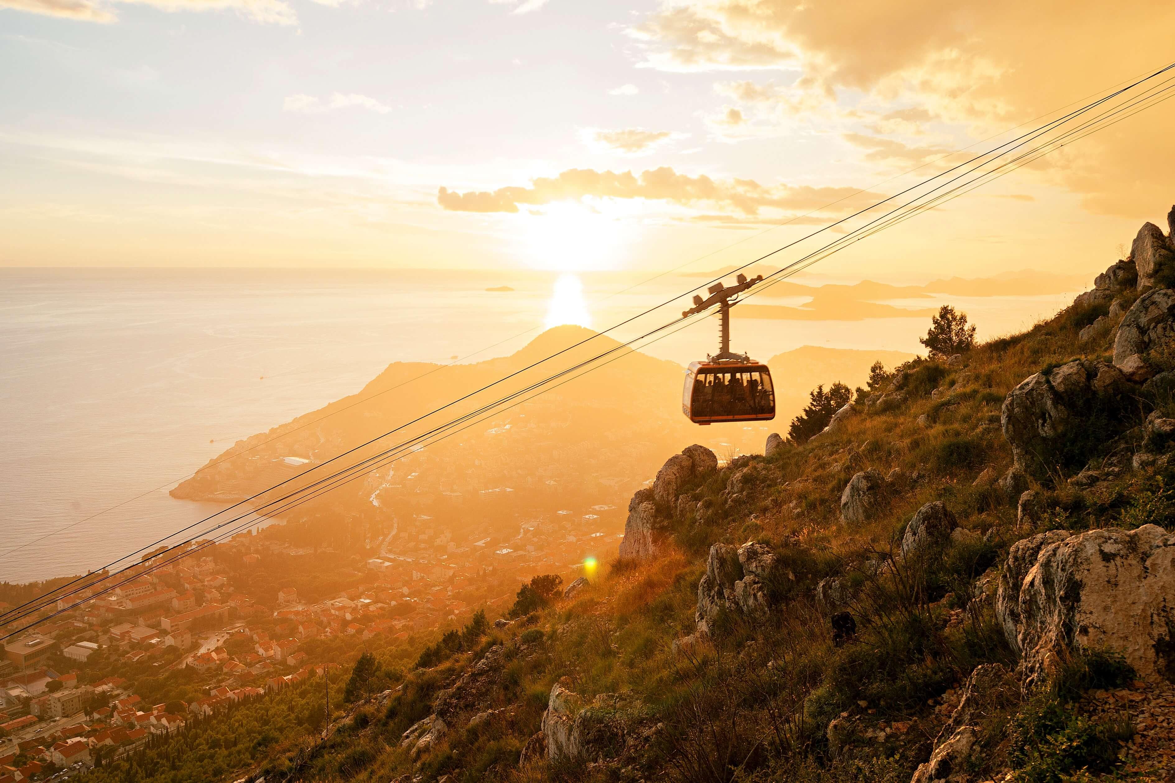 Climb the mountain in a cable car image