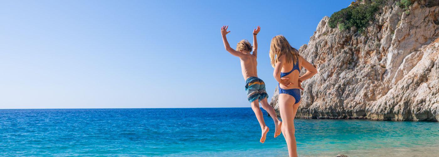 Boy dives into sea in Antalya