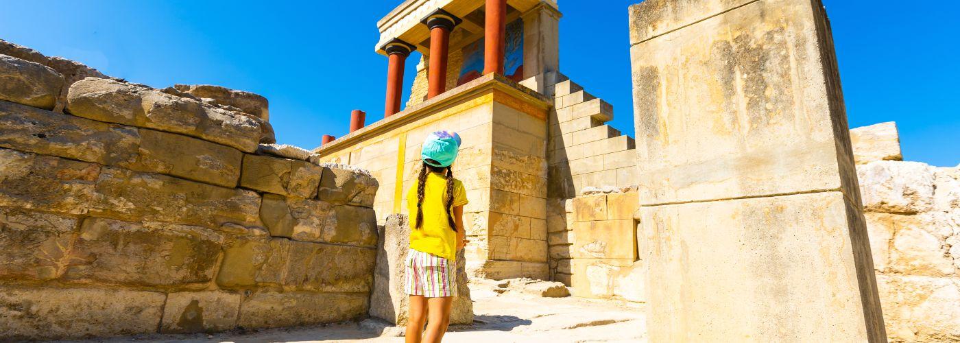 Girl admires the Minoan Palace in Crete