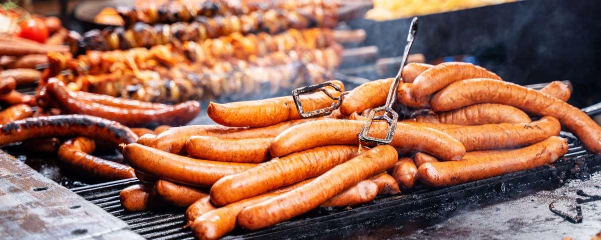 Roasted pork sausages at Christmas market stall 