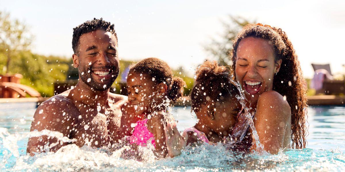 Family splashing in a pool