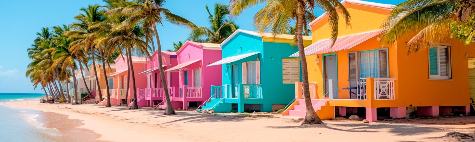 A group of colourful houses on a Dominican Republic beach