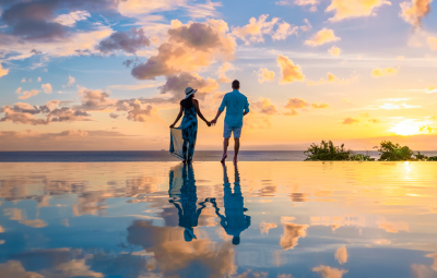 A couple watching the sunset for Valentine's in the Caribbean