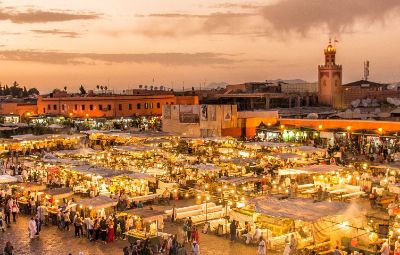 Jemaa el-Fnaa square, Marrakech, in October — bustling night market with food stalls.