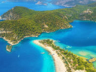 Turquoise lagoon and white-sand spit at Ölüdeniz Blue Lagoon, Fethiye, on Turkey's Turquoise Coast.